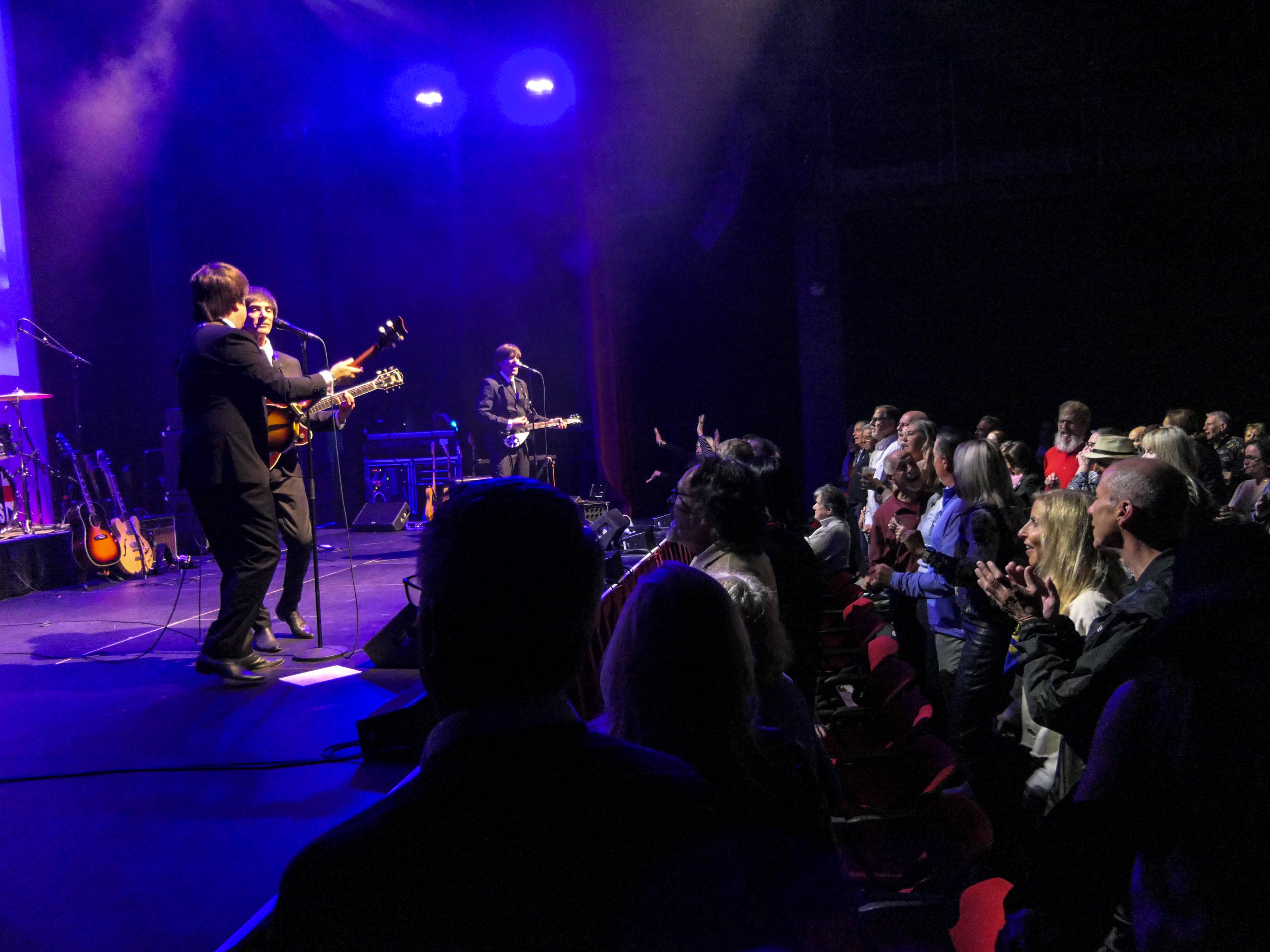 Abbey Road, portraying the Beatles, performs during the 