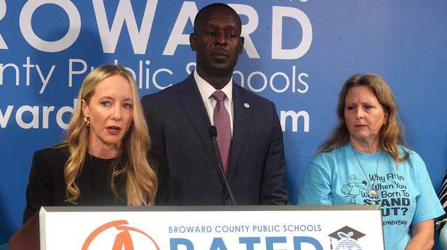 Broward County School Board Chair Sarah Leonardi, left, Superintendent Howard Hepburn and board member Debra Hixon during a news conference at the Kathleen C. Wright Administration Center in Fort Lauderdale, Tuesday, Jan. 13, 2026. (Joe Cavaretta/South Florida Sun Sentinel)