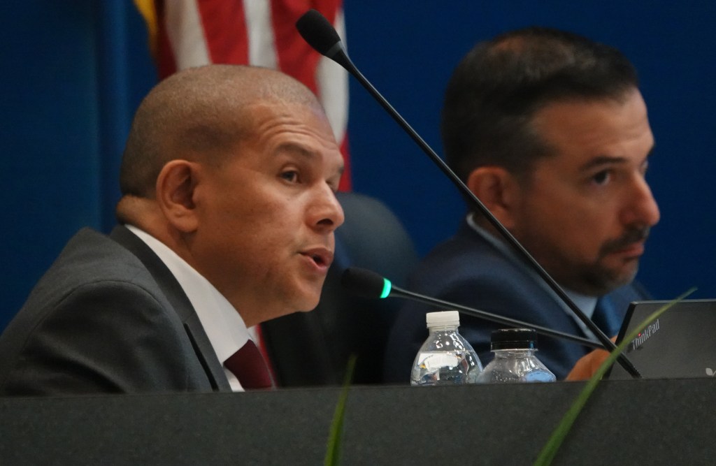 School Board OKs plan to cut 1,000 jobs a year for 3 years