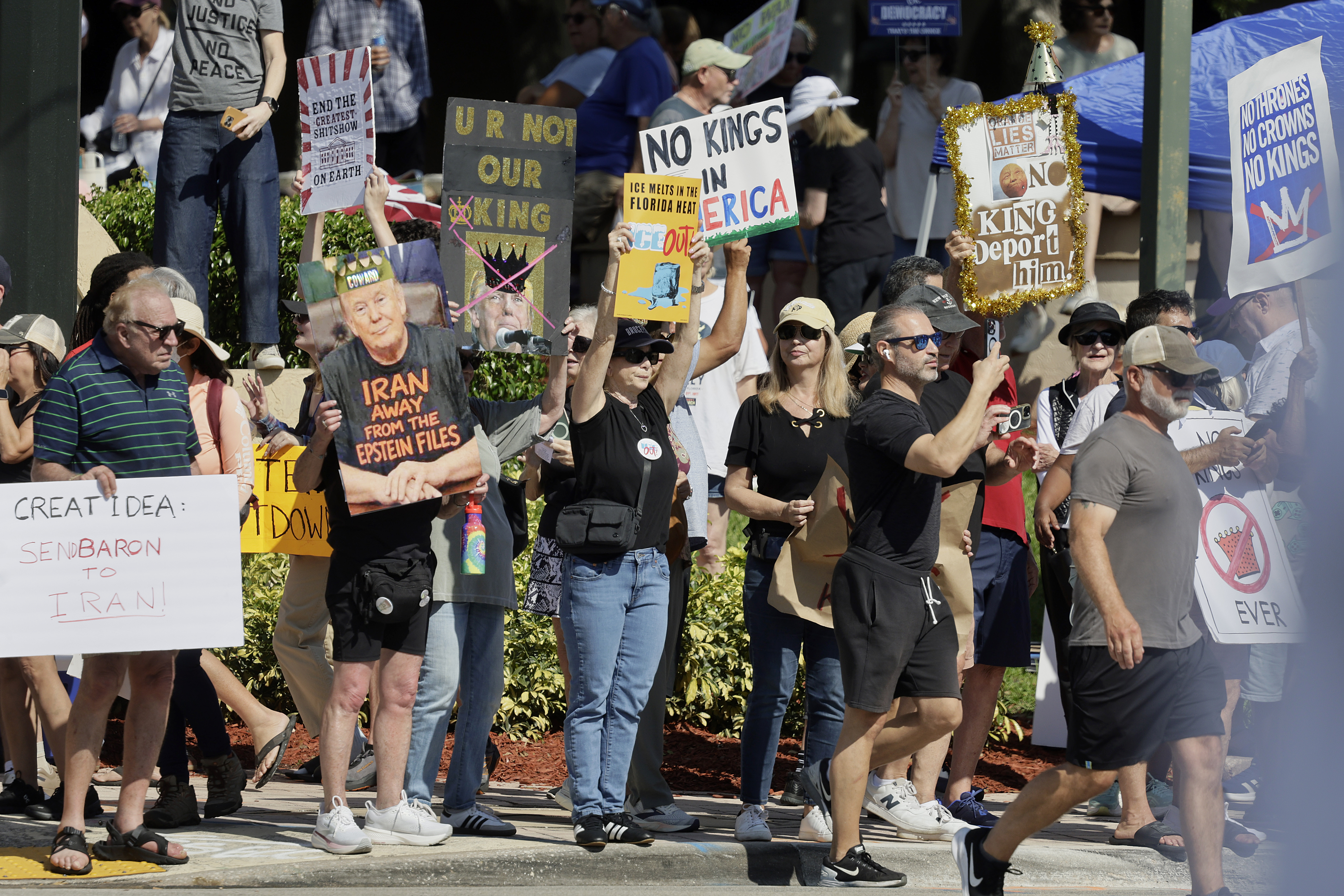 Protesters gather near Boca Raton City Hall on Saturday, March...