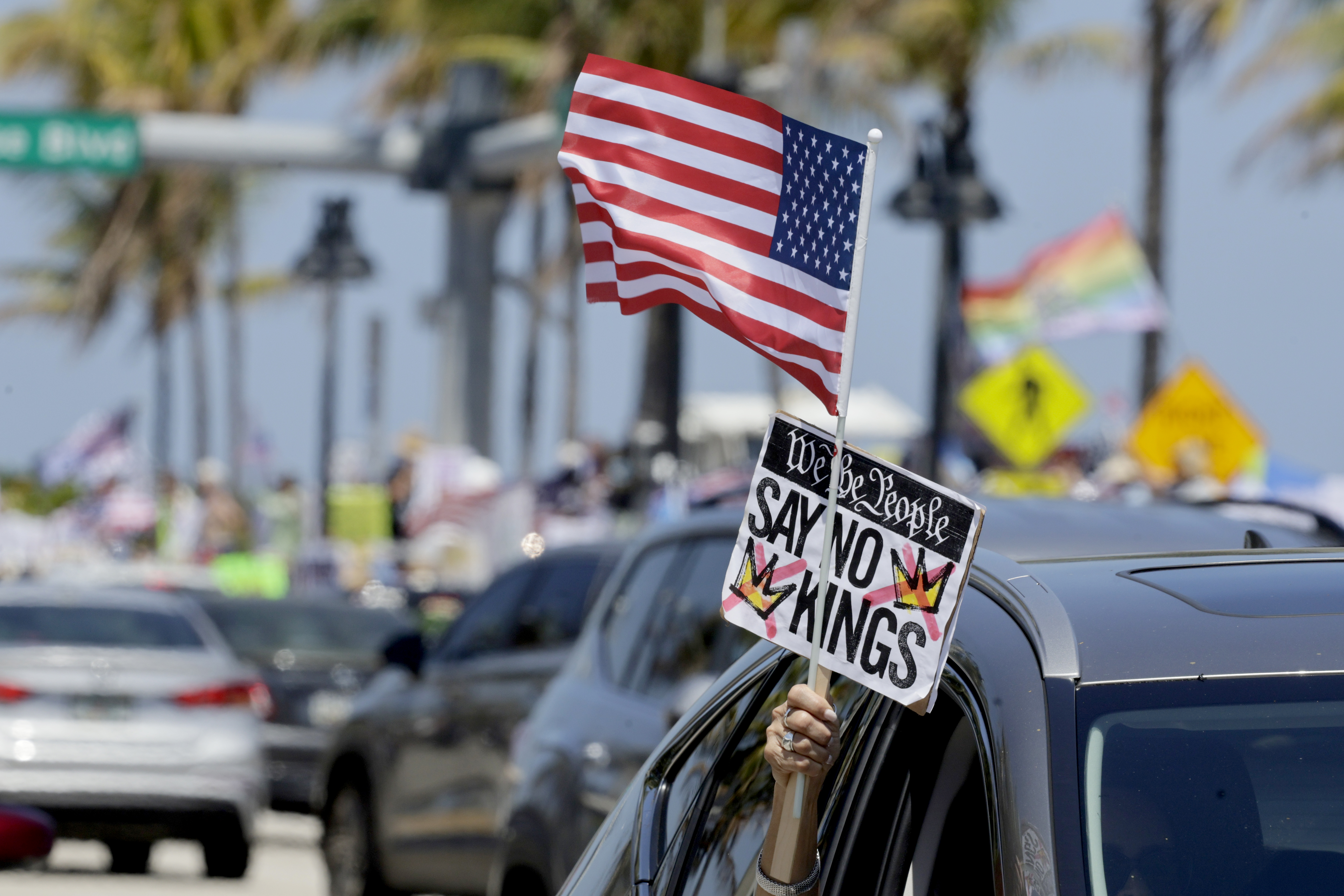 Protesters gather near Sunrise Blvd. and A1A in Fort Lauderdfale...