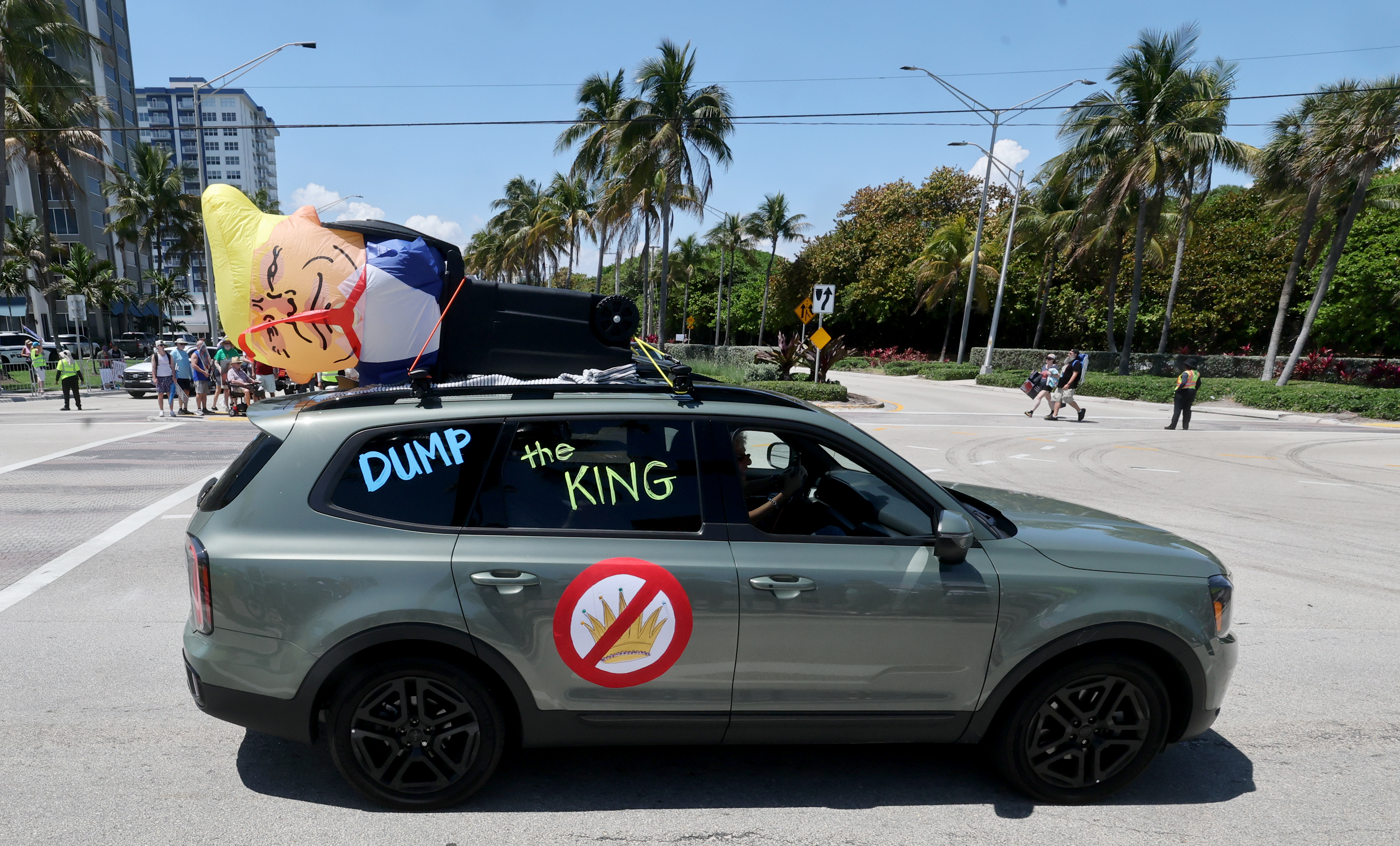 Protesters gather near Sunrise Blvd. and A1A in Fort Lauderdfale...
