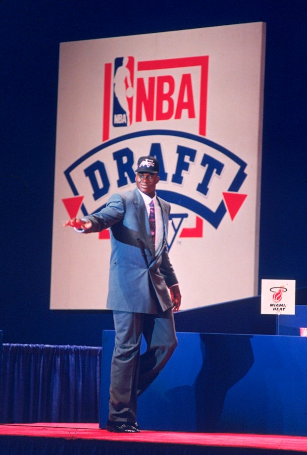 Shaquille O'Neal waves to the crowd after the Orlando Magic select him with the No. 1 pick in the 1992 NBA Draft. The LSU player was 7 feet, 1 inches tall with an even larger personality that quickly drew attention to him and the expansion Magic. He played for Orlando from 1992 to 96, leading the team to the NBA Finals before leaving to join the L.A. Lakers. (Don Ryan/The Associated Press file)
