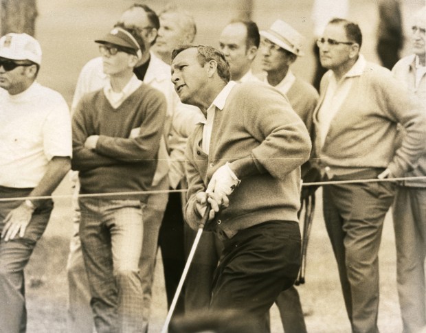 Arnold Palmer watches his shot at the Florida Citrus Invitational at Rio Pinar ni Orlando on March 7, 1970. Palmer's presence in Central Florida, his purchase of Bay Hill in the mid-1970s, and the PGA tournament he hosted there, now called the Arnold Palmer Invitational, helped make the area a pro golf mecca. (Orlando Sentinel file)