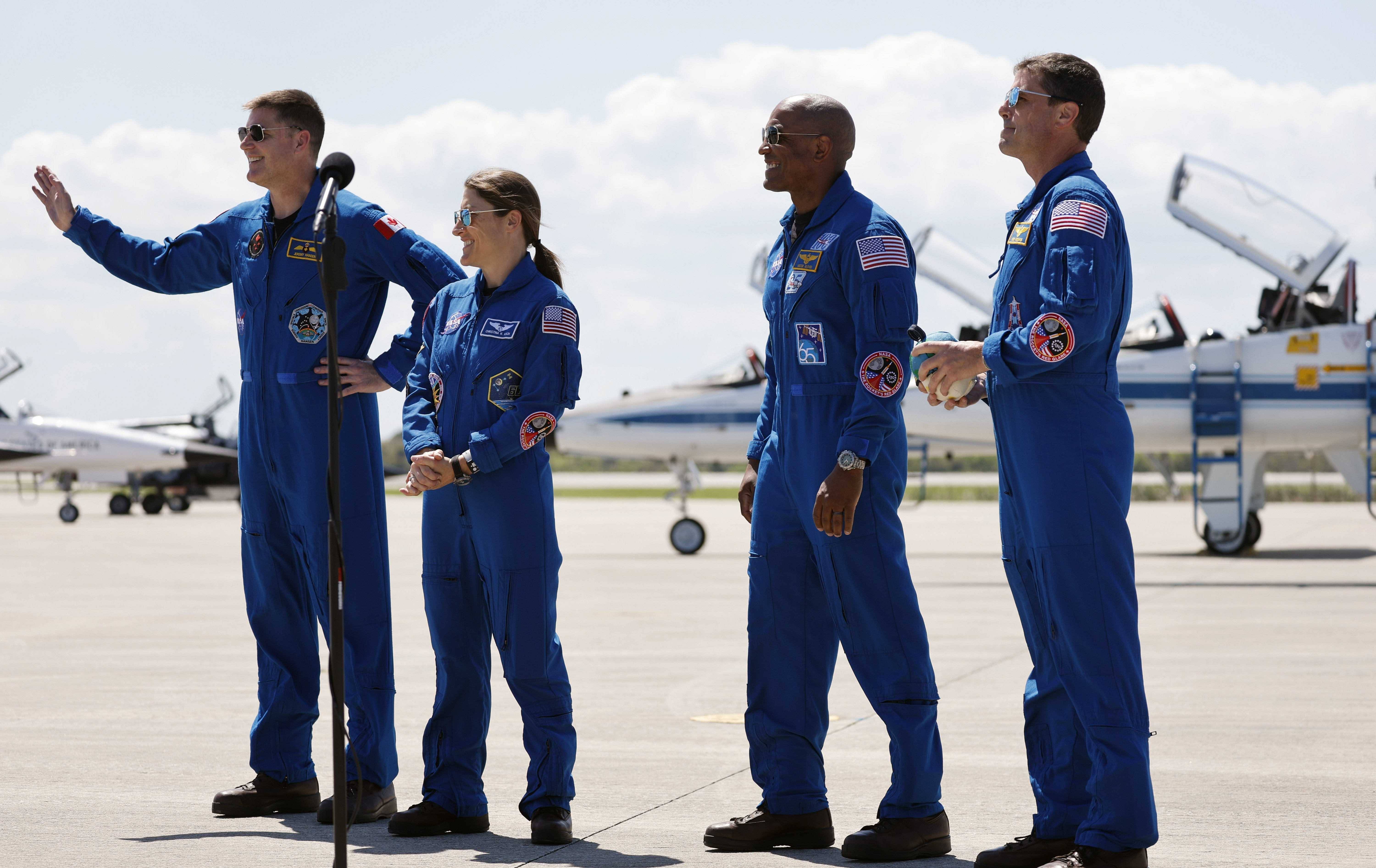 From left, Artemis II crew mission specialists Jeremy Hansen and...