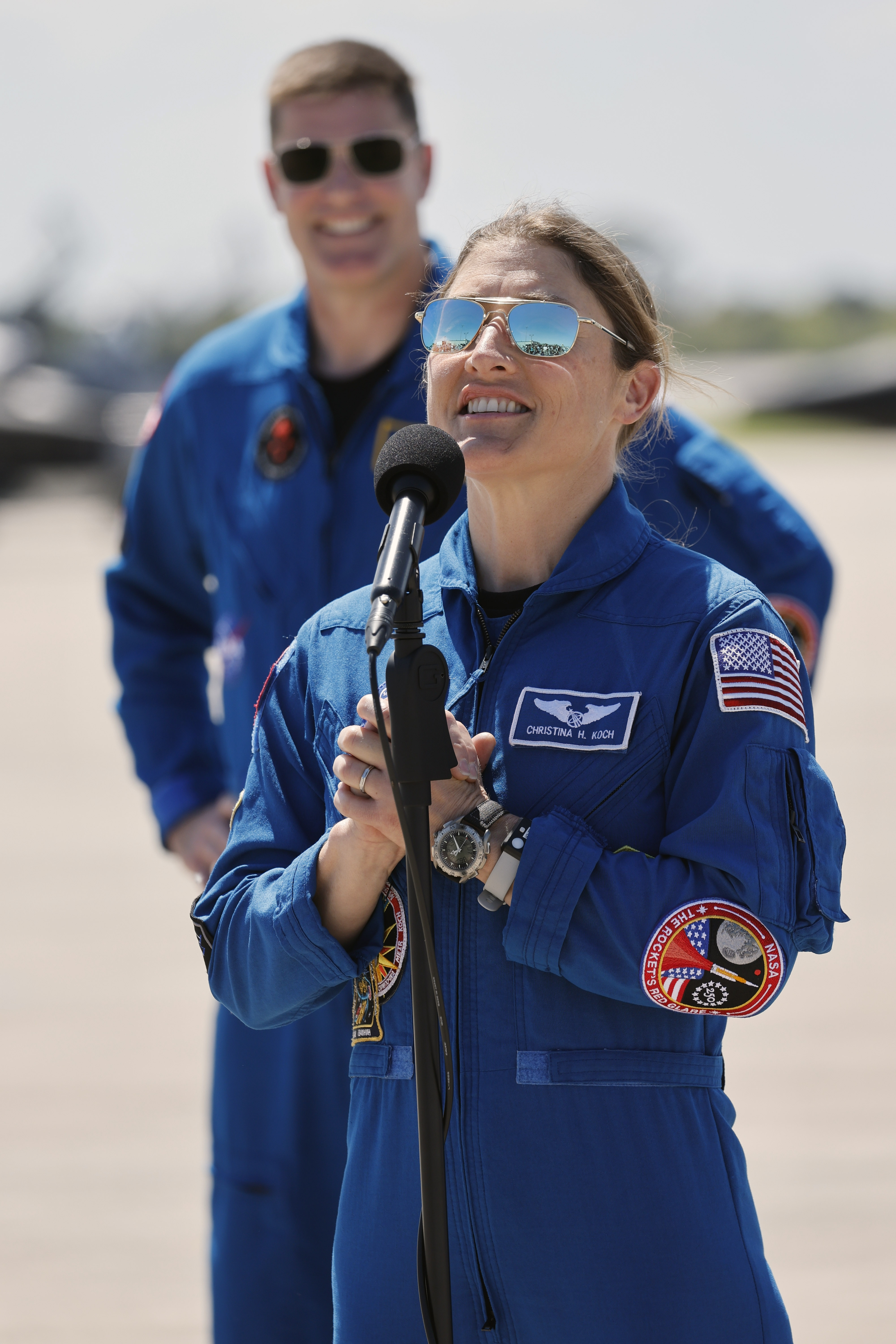 Artemis mission specialists Jeremy Hansen and Christina Koch talk to...