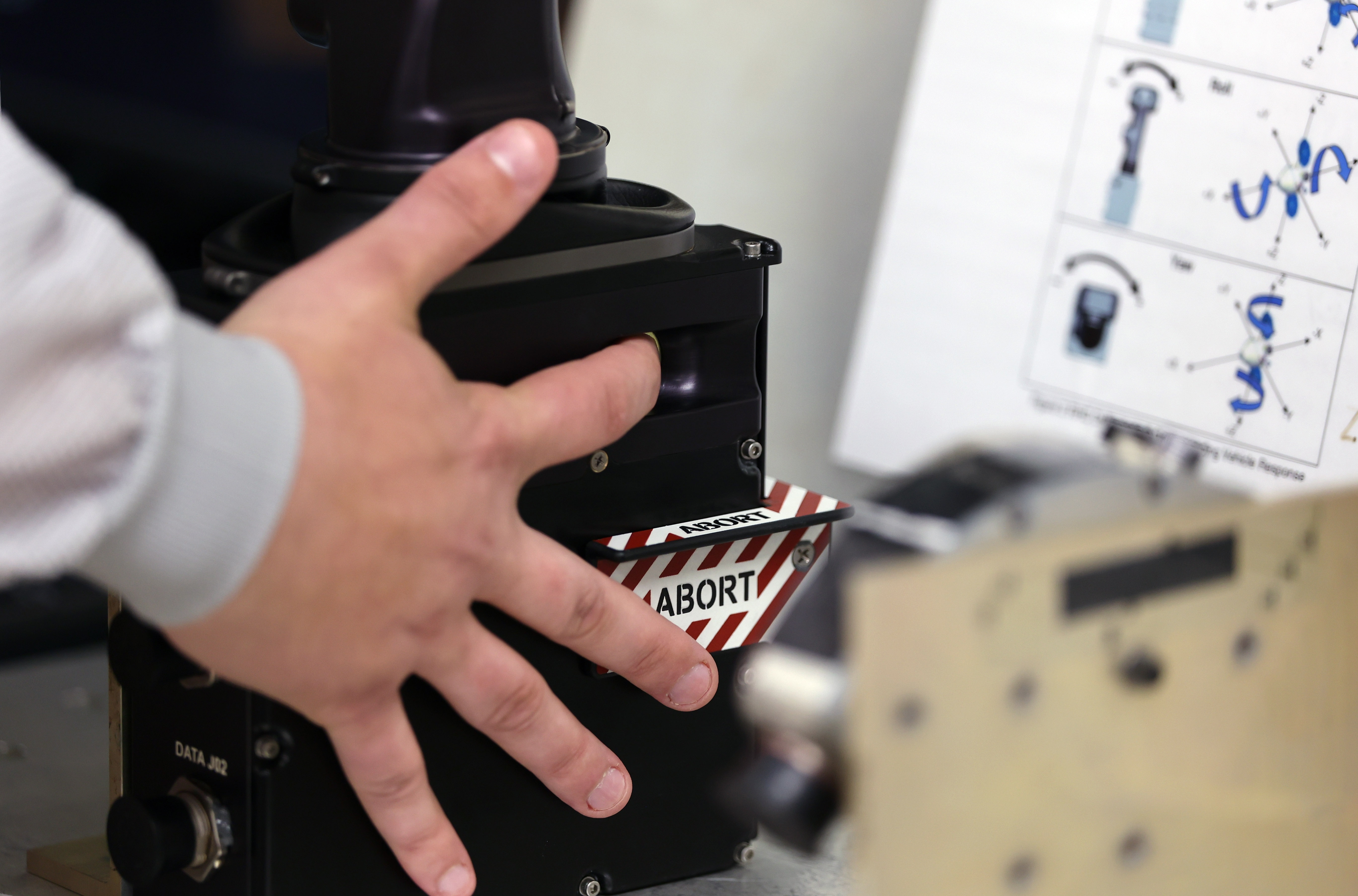 Stephen Doerbecker, Program Manager for Orion Space System, demonstrates the...