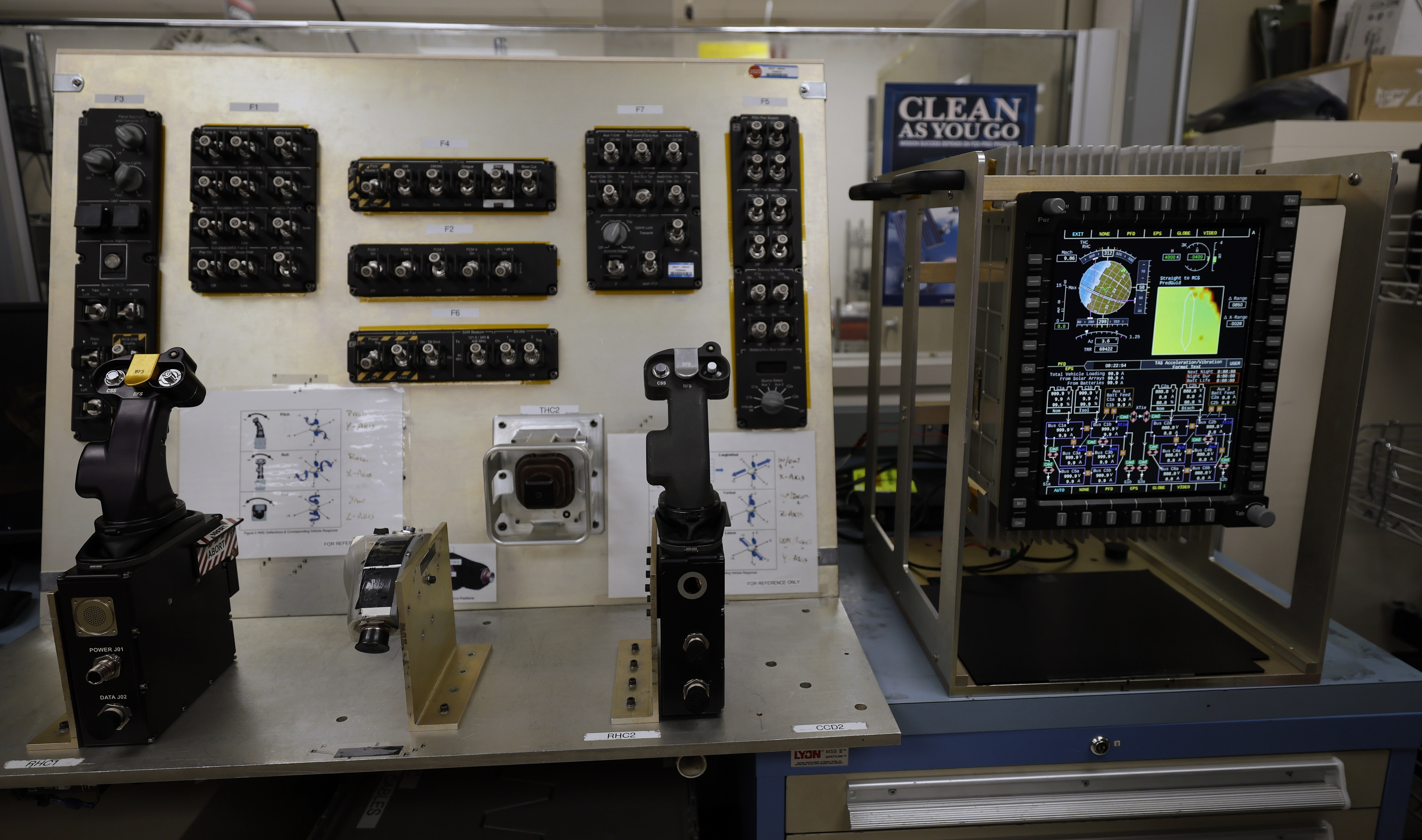Controls for Orion, including switch interface panels; rotational hand controllers;...