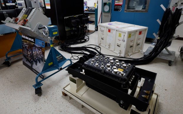 Left to Right, RS-25 engine controller for the SLS; and the previous generation controller from the Space Shuttle (serial number: 2); during a tour of the Honeywell Aerospace Clearwater, Fla. facility where mission-critical systems for the Orion spacecraft and the Space Launch System (SLS) rocket are designed, built, and tested, on Friday, February 27, 2026. (Ricardo Ramirez Buxeda/ Orlando Sentinel)