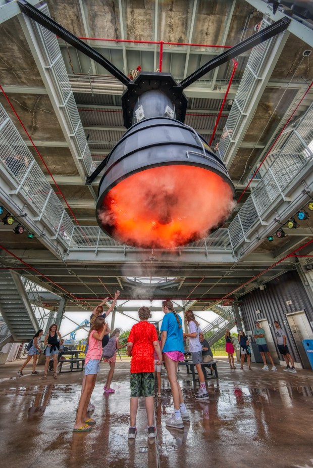 Kennedy Space Center Visitor Center guests check out the Gantry at LC-39, a new experience that includes a test-fire simulation. (Ricardo Ramirez Buxeda/Orlando Sentinel)
