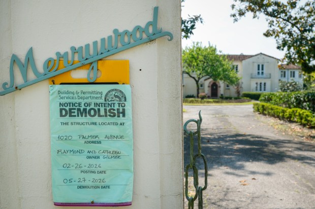 A notice of demolition is posted at the Merrywood property at 1020 Palmer Ave. in Winter Park on Tuesday, March 24, 2026. The home was built by James Gamble Rogers, the same architect responsible for Casa Feliz. Local residents and preservationists are advocating for the house's preservation, with concerns that it will be demolished unless they find a buyer for the property. (Rich Pope/Orlando Sentinel)