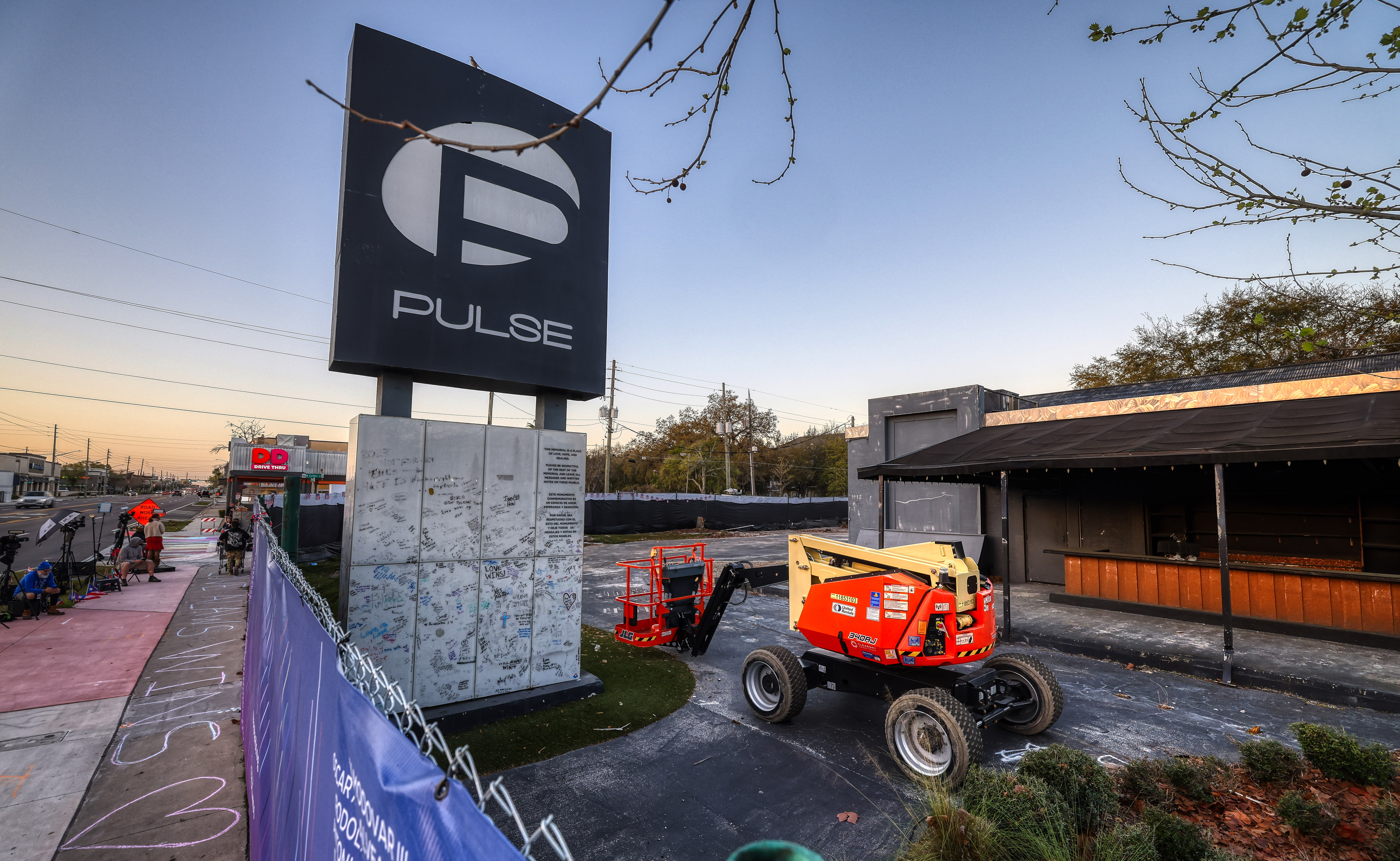 Workers begin the process of taking down the Pulse nightclub...