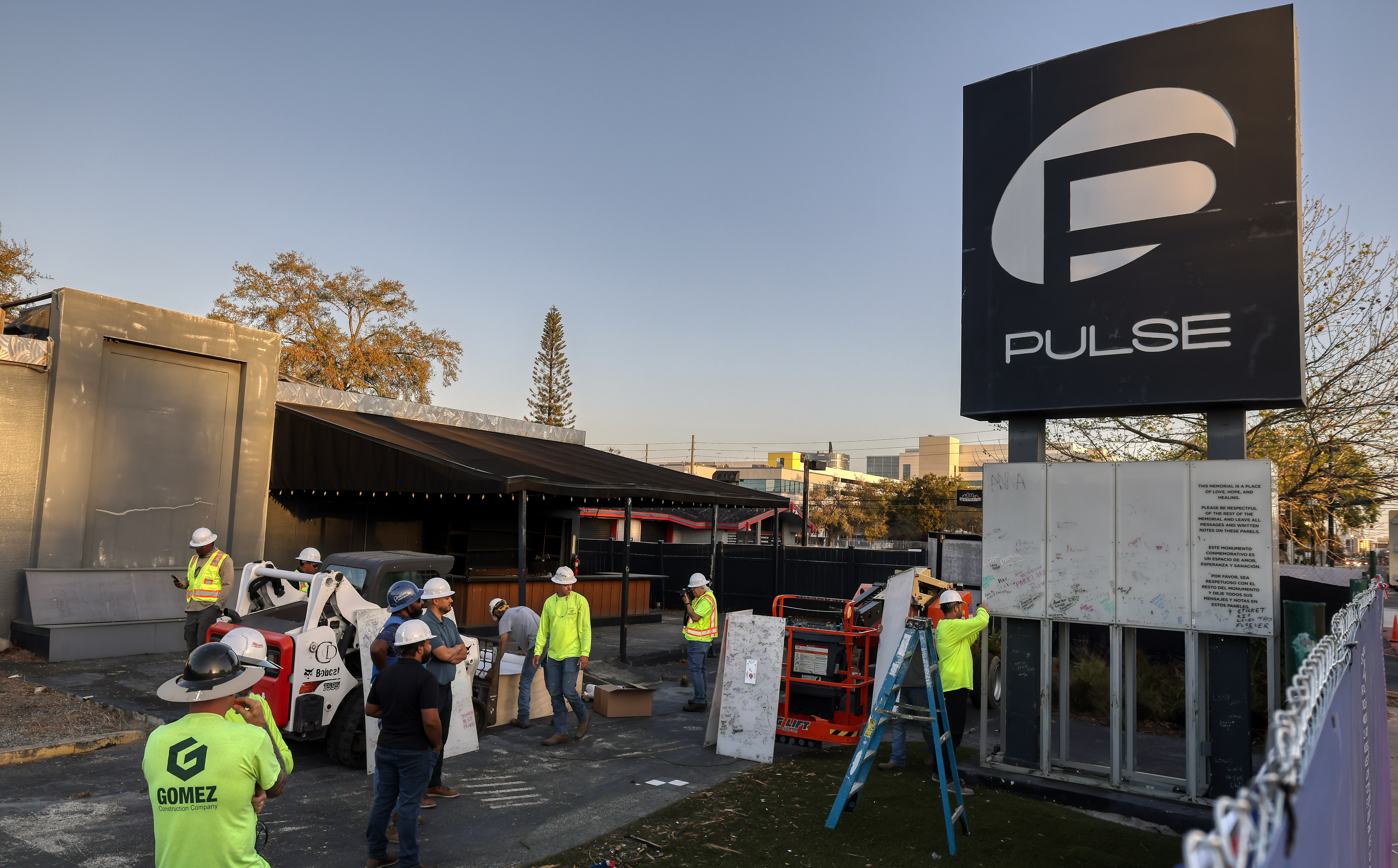 Workers begin the process of taking down the Pulse nightclub...