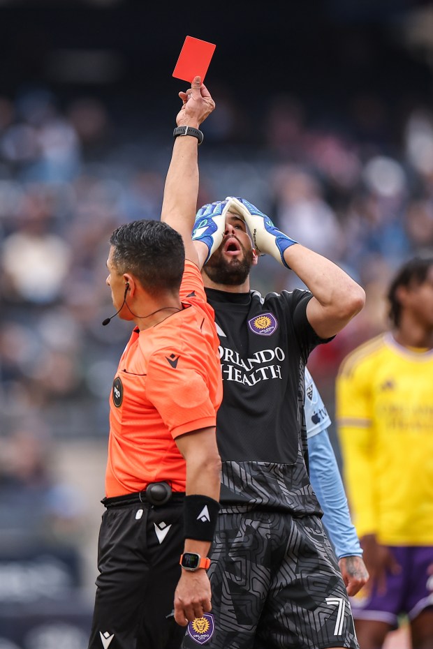Maxime Crépeau #77 of Orlando City SC reacts as he is shown a red card during the first half of an MLS match against New York City FC at Yankee Stadium on March 07, 2026 in New York, New York. (Photo by Dustin Satloff/Getty Images)