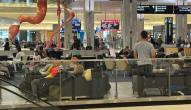 Several passengers wait at Tampa International Airport as flights get cancelled or delayed due to severe weather. (Spectrum News/Sarah Blazonis)