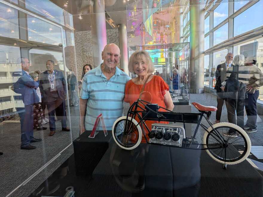 Ken and Maria Wilson, pictured here at the MIA Glenn Curtiss exhibit, met at the airport in the 1980s and have been married for 40 years.