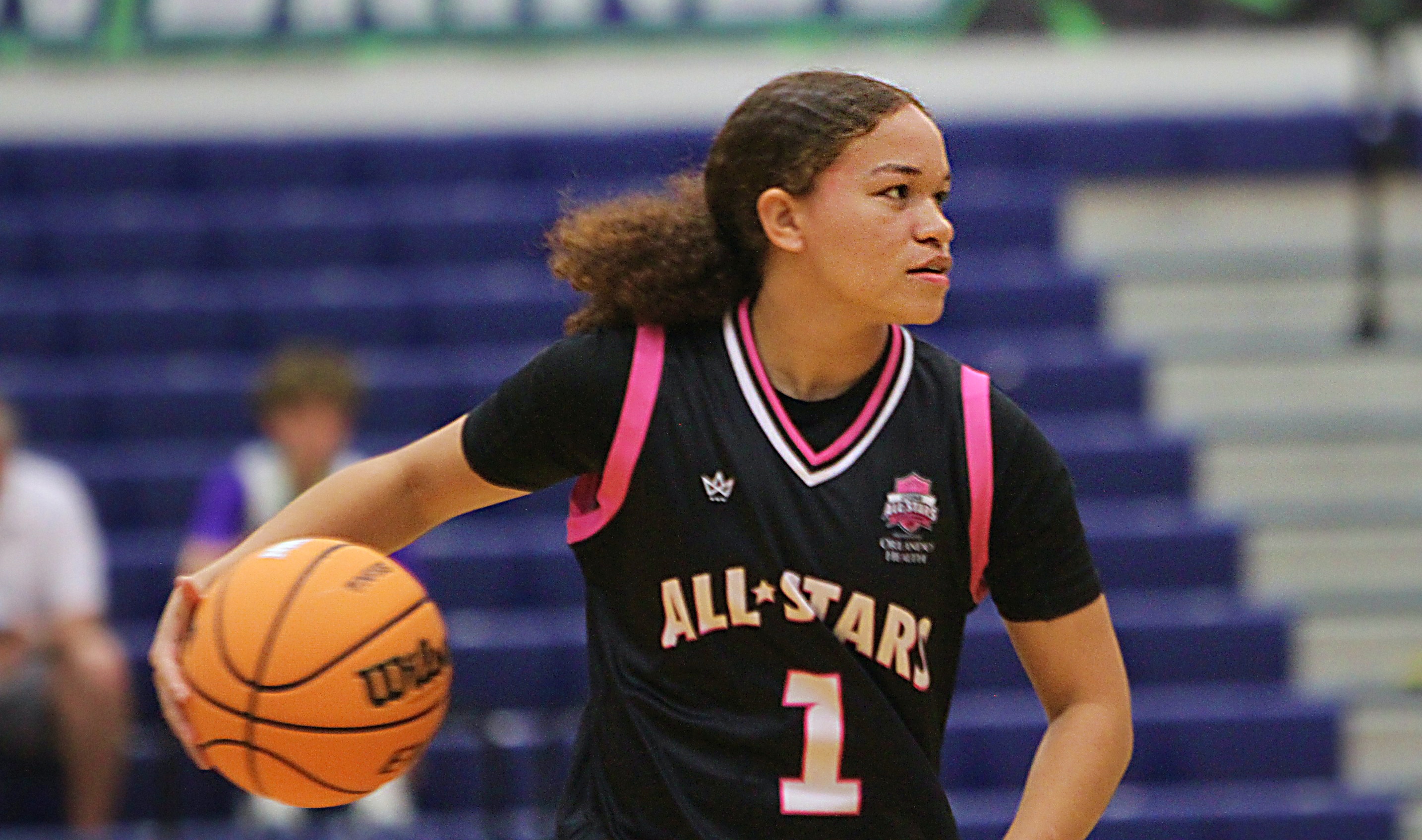 Valeria Munoz of Lake Highland Prep dribbles up the floor...