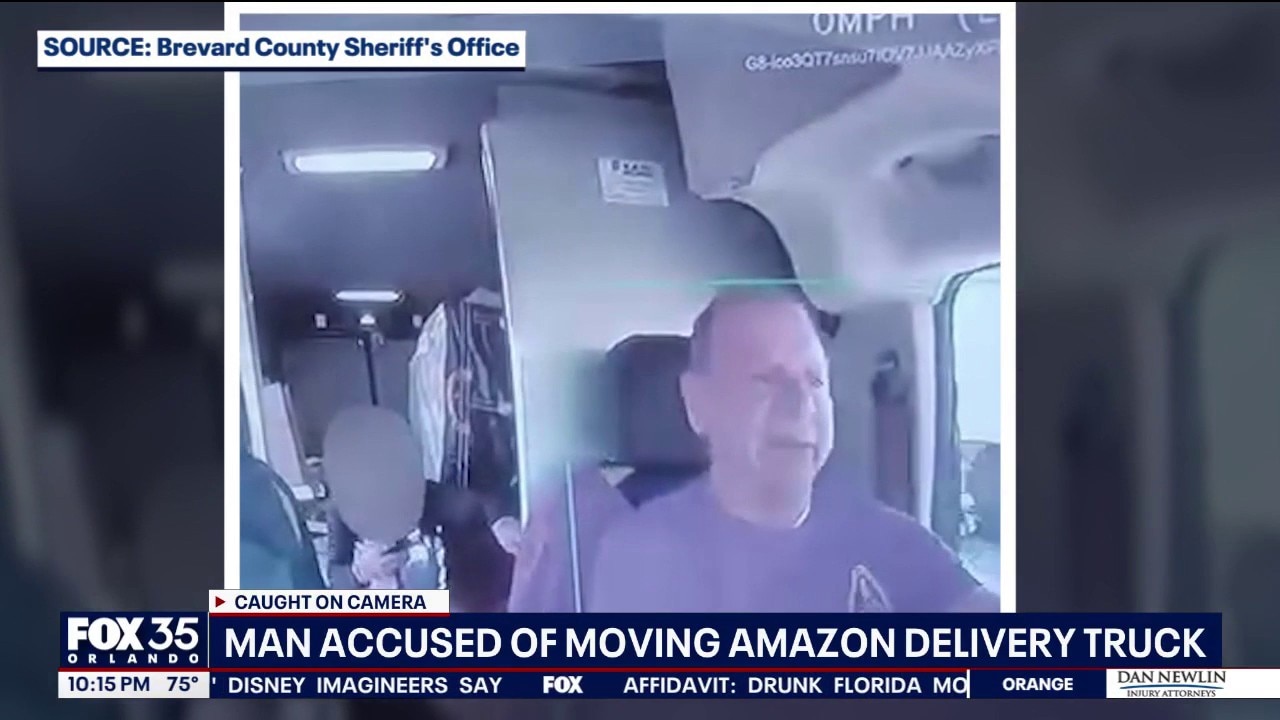 Man accused of moving Amazon delivery van with driver inside