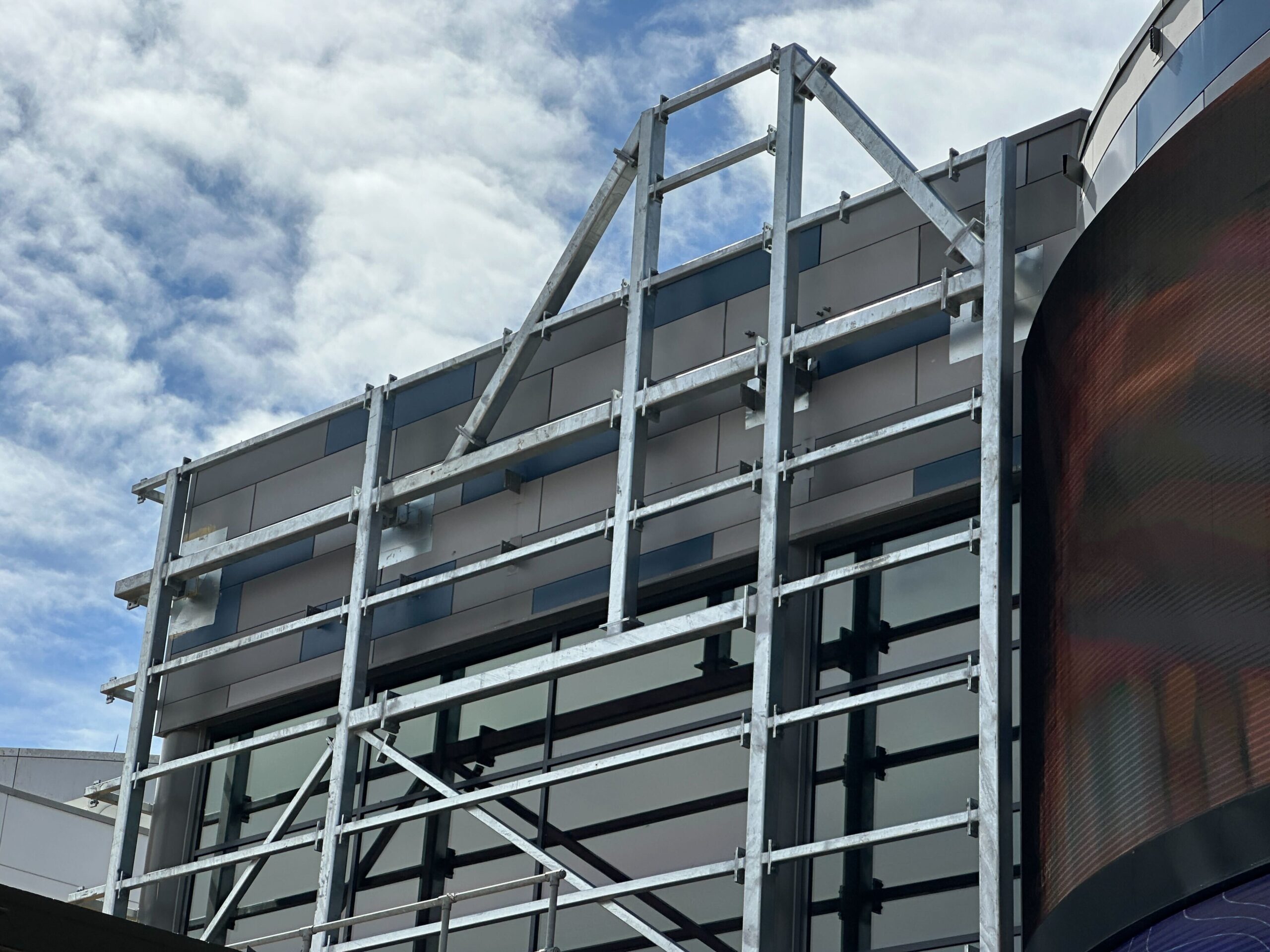 On the front side of the building, holes on the decorative facade have now been filled with steel in at least four spots behind the steel scaffolding.