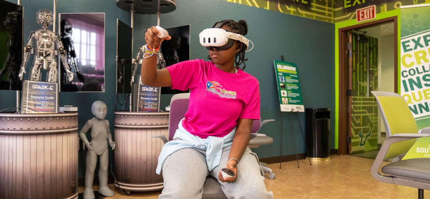 Student wearing virtual reality headset