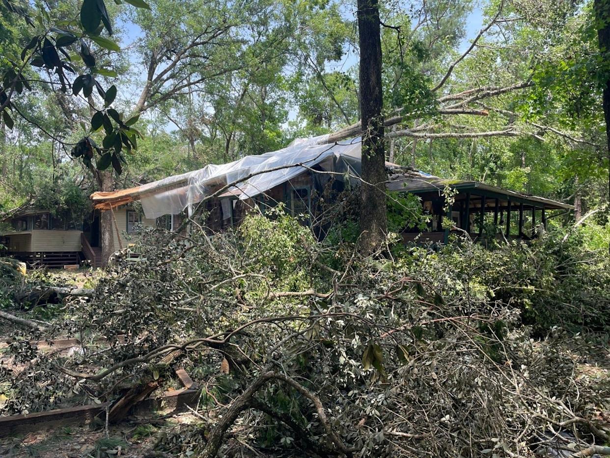 The school, seen in this file photo, was buried under fallen trees after three tornadoes ravished the state capital in 2024.