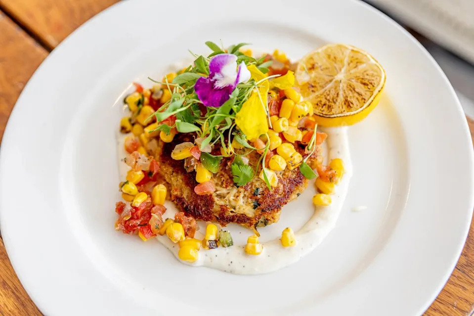 Guests will enjoy special dishes (pictured) and racing simulators. Grove Bay Hospitality