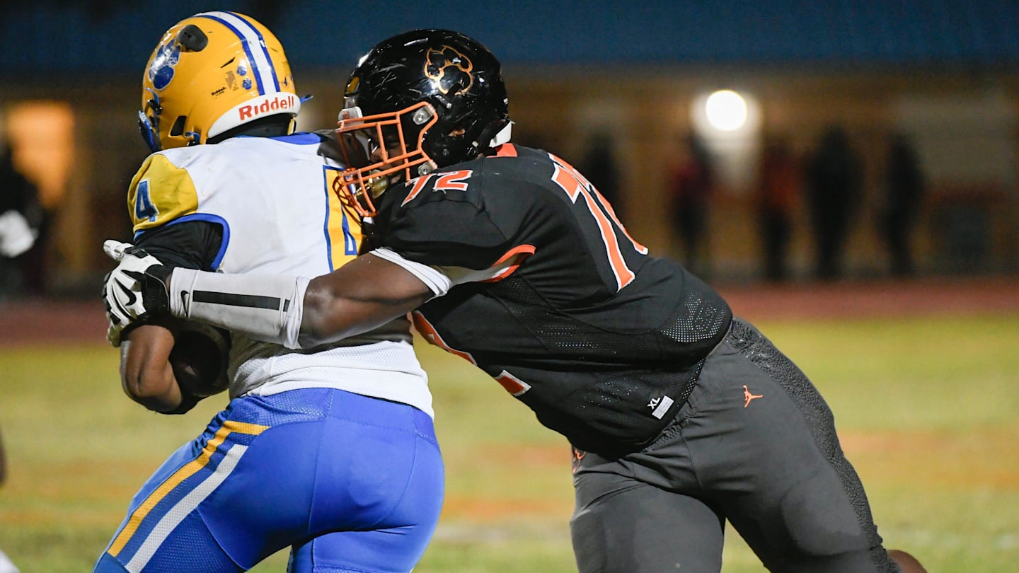 Chavez “Sandman” Thompson of Cocoa tackles Newberry Panthers ballcarrier Logan McCloud during the FHSAA Class 2A Region 2 finals, Friday, November 29, 2024. Craig Bailey/FLORIDA TODAY via USA TODAY NETWORK