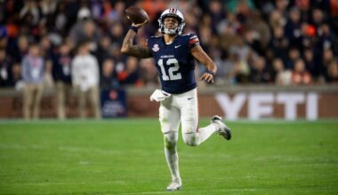 Auburn Tigers quarterback Ashton Daniels (12) pump fakes a pass as Auburn Tigers take on Kentucky Wildcats at Jordan-Hare Stadium in Auburn, Ala. on Saturday, Nov. 1, 2025. Auburn Tigers and Kentucky Wildcats are tied 3-3 at halftime.