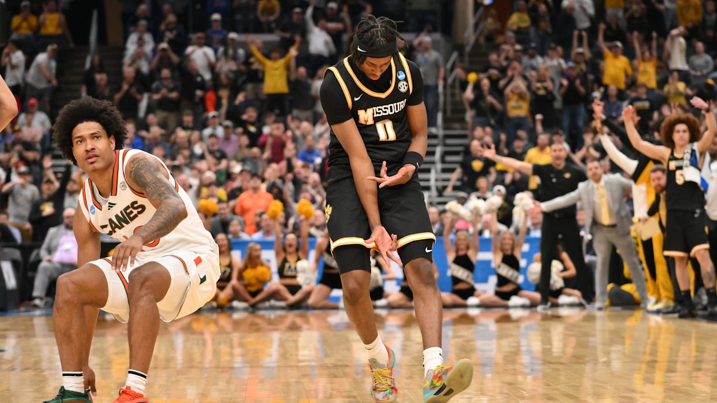 Mar 20, 2026; St. Louis, MO, USA; Missouri Tigers guard Anthony Robinson II (0) reacts after shooting a three pointer during the second half against the Miami (FL) Hurricanes during a first round game of the men's 2026 NCAA Tournament at Enterprise Center. Mandatory Credit: Jeff Curry-Imagn Images