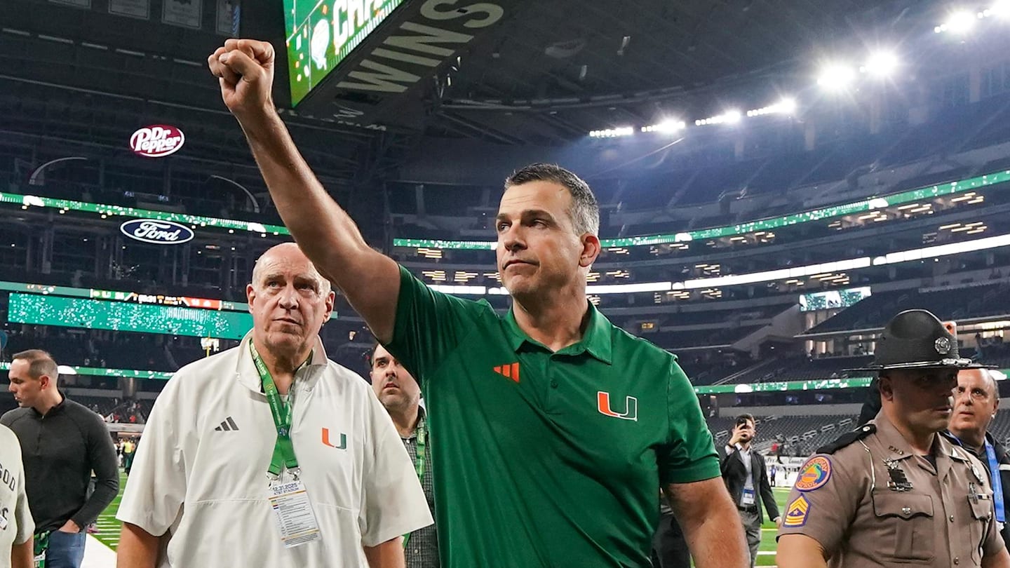 Dec 31, 2025; Arlington, TX, USA; Miami Hurricanes head coach Mario Cristobal leaves the field following the 2025 Cotton Bowl and quarterfinal game of the College Football Playoff against the Ohio State Buckeyes at AT&T Stadium. Mandatory Credit: Raymond Carlin III-Imagn Images