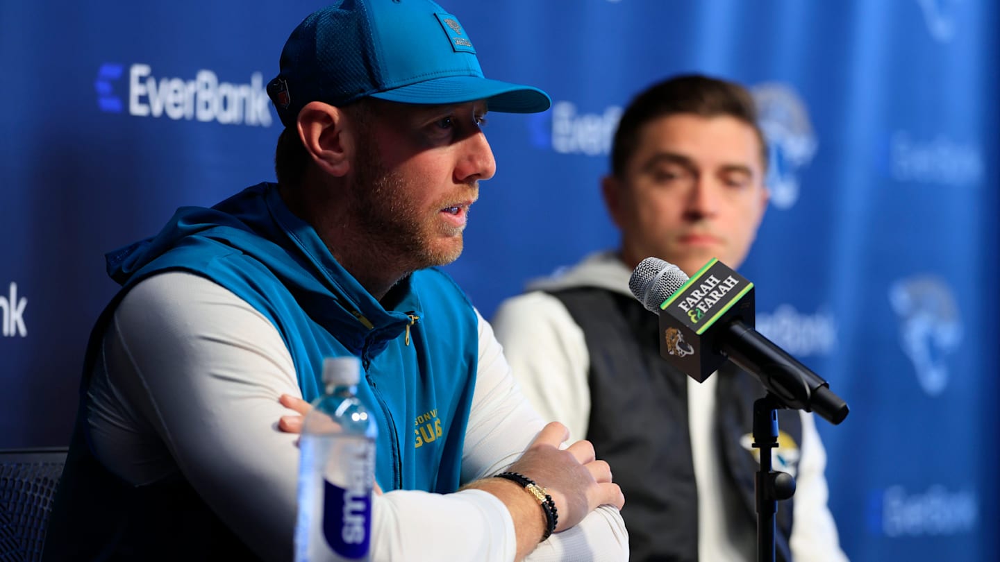 Jacksonville Jaguars head coach Liam Coen speaks during a press conference as general manager James Gladstone looks on at the Miller Electric Center, Wednesday, Jan. 14, 2026, in Jacksonville, Fla.