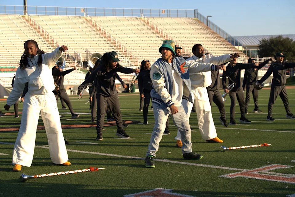 Grammy-winning rapper Ludacris visits FAMU's Marching 100 after the band performed the "Pull Over Challenge," a viral social media campaign promoting his new single.