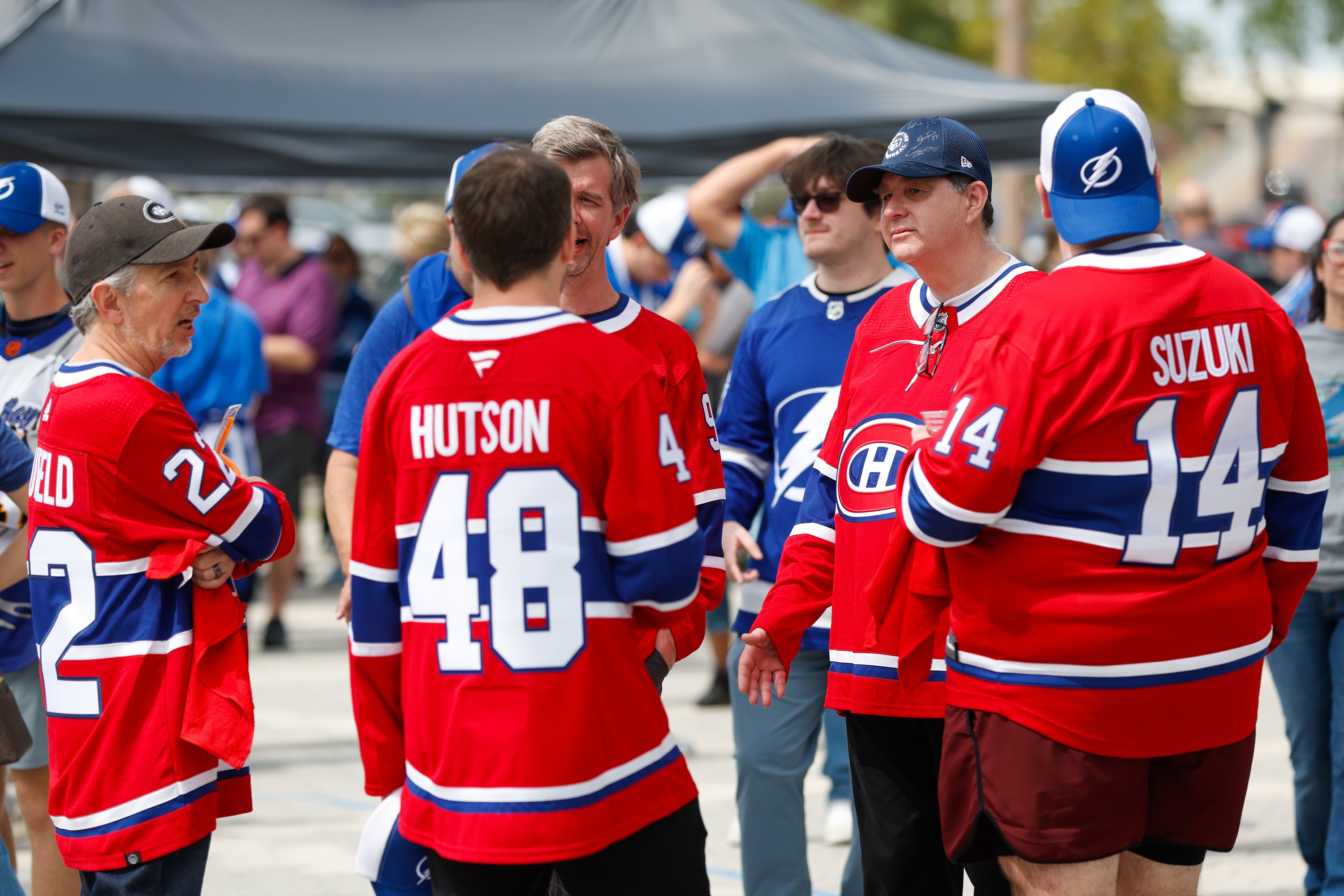 Montreal Canadiens fans gather ahead of a game against the Tampa Bay Lightning at Thunder Alley outside of Benchmark International Arena on Sunday, April 19, 2026, in Tampa.