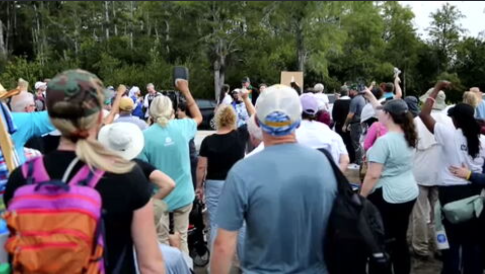 Protesters hold vigil outside ‘Alligator Alcatraz’ to shine light on alleged claims of abuse, cruelty - WSVN 7News | Miami News, Weather, Sports