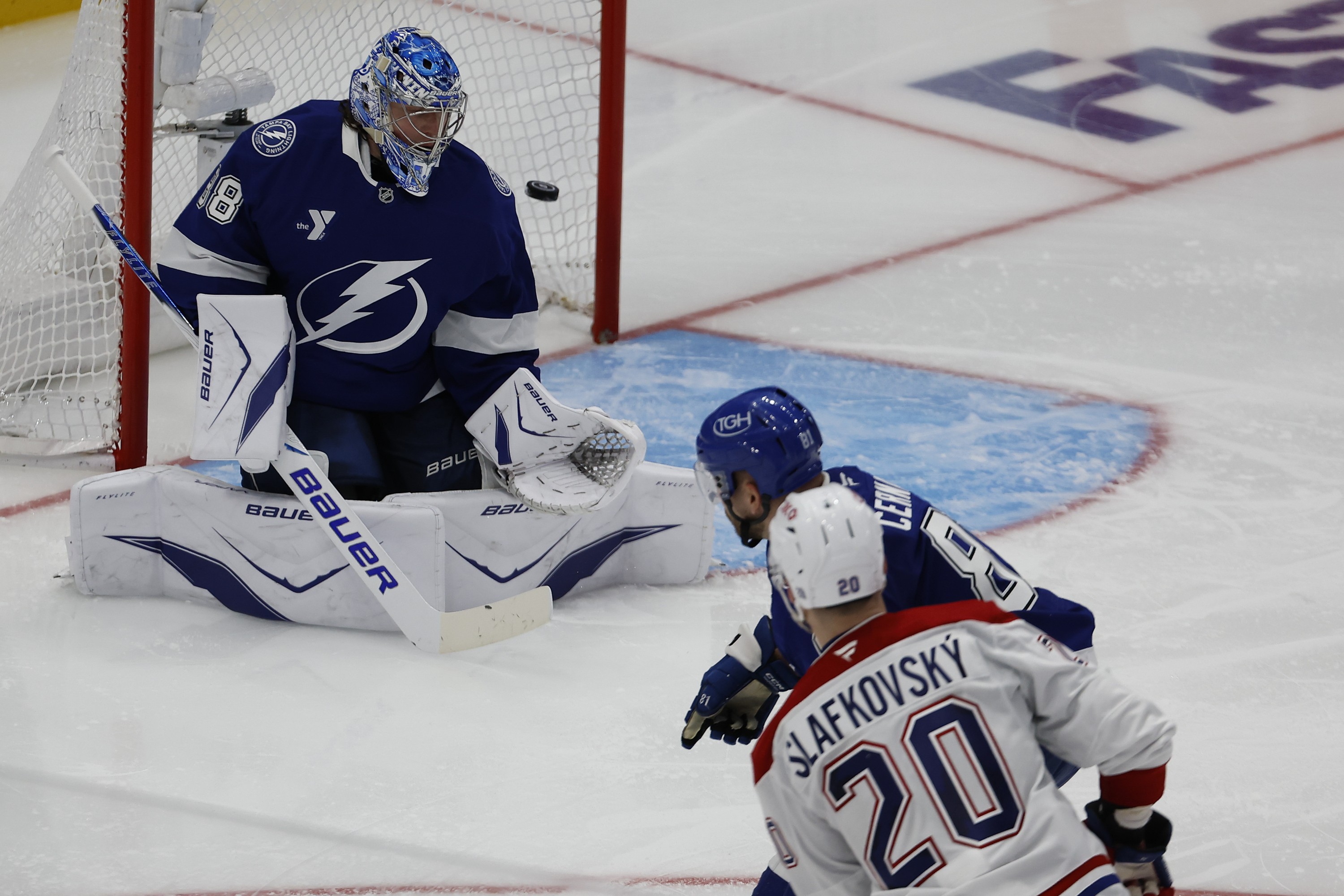 Canadiens' Juraj Slafkovsky scores overtime winner on Lightning goaltender Andrei Vasilevskiy in Game 1 Sunday in Tampa, Fla.