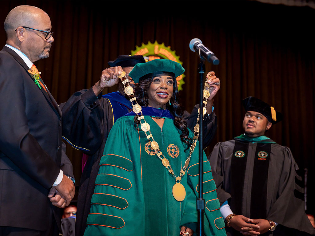 President Johnson receives her chain