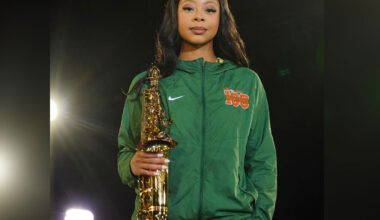 Florida A&M University student Rae’Kwan Bostic poses with her saxophone as a member of the Marching 100.