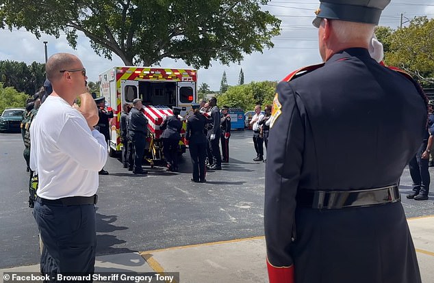 After arriving at the medical examiner's office, a line of sheriff's deputies, firefighters, and paramedics saluted Lepselter as his body was brought inside