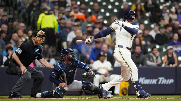 Milwaukee Brewers' Brice Turang hits a two-run single during the...