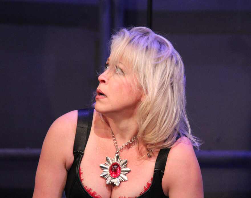 The moment Caesar (Shelley Sanders) realizes she is about to be killed.