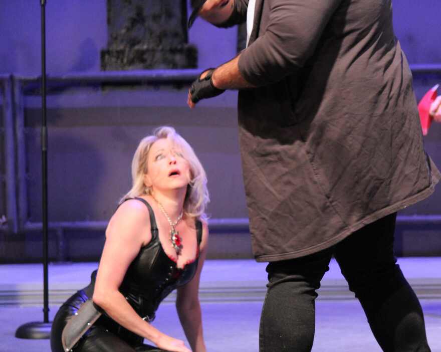 Shelley Sanders as Julius Caesar being beaten and stabbed to death in assassination scene midway through the play.