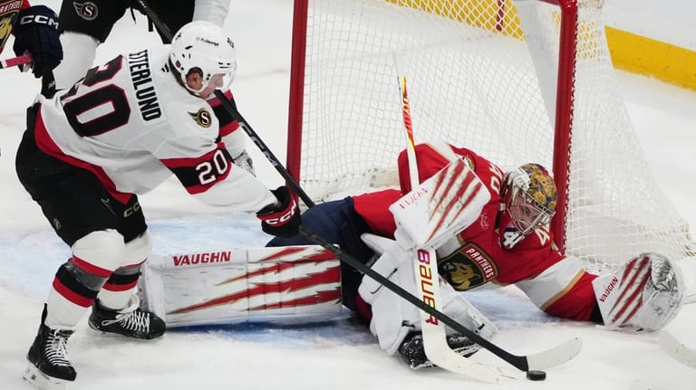 Florida Panthers goaltender Daniil Tarasov (40) defends the goal against...