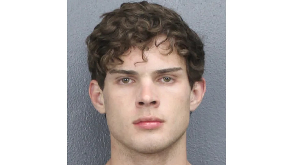 Clavicular in a mugshot in Florida jail