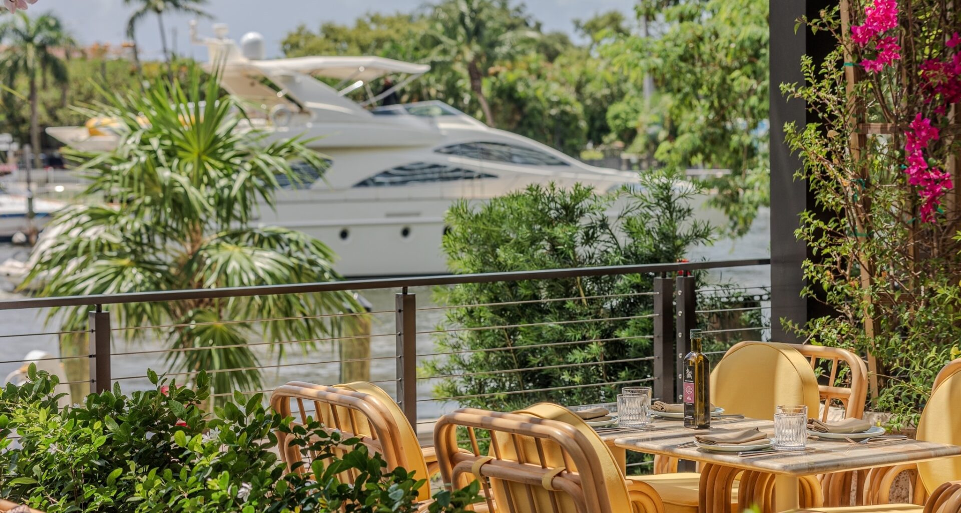 Elia on the River Pairs Coastal Italian Plates with Yacht Views