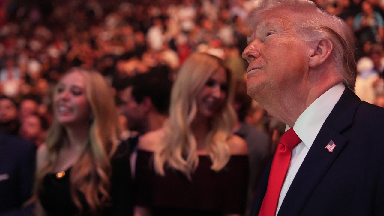 Trump takes the spotlight at UFC 327 in Miami, greeting Rogan and Rubio