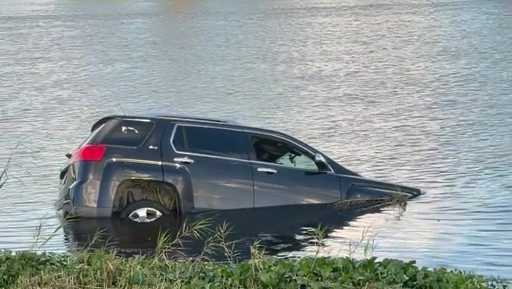 Officials investigate vehicle crash in canal at Florida park