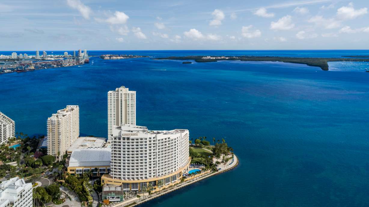 A 23-story hotel in exclusive Miami locale vanishes in seconds with implosion