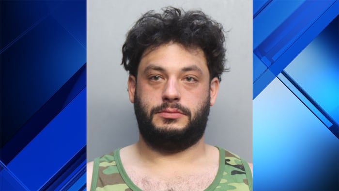 Man accused of abusing dog after it peed in elevator of Miami condo building