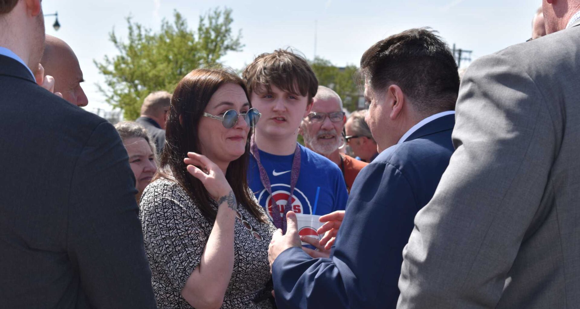 Jacksonville Alderwoman Eren White-Williams speaks with Gov. JB Pritzker during his visit to the city. White-Williams resigned from her position April 7.