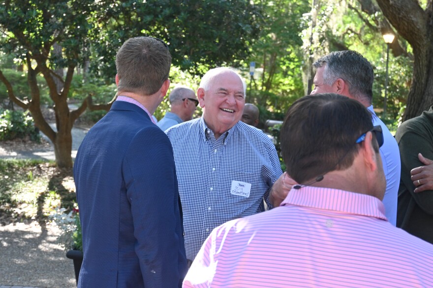Former State Senator Bill Muntford talks with other guests at Tom Derzypolski's Tallahassee City Commission campaign launch party.